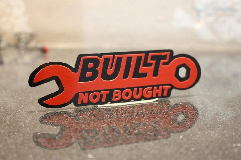 BUILT NOT BOUGHT WRENCH HARD PLASTIC REFLECTOR LOGO BIKE CAR