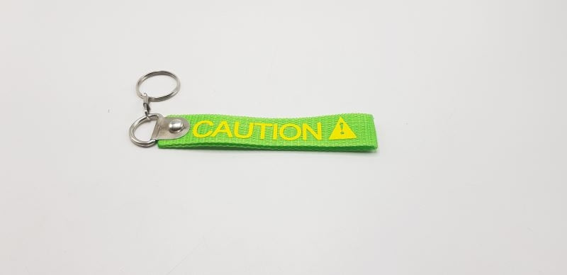 Caution Green Fabric Keychain