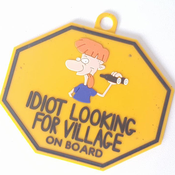 Idiot Looking For Village On Board Hanging Tag