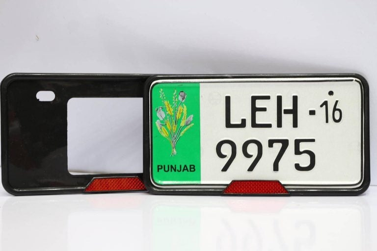 No. Plate Frame With Reflector